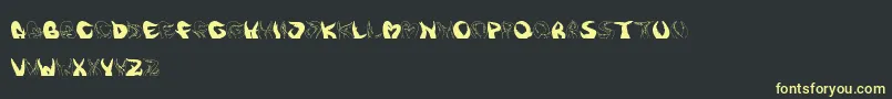 Tentakelfun Font – Yellow Fonts on Black Background