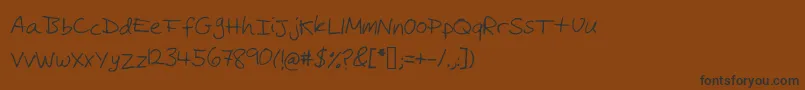 Czcionka Michaelfont – czarne czcionki na brązowym tle