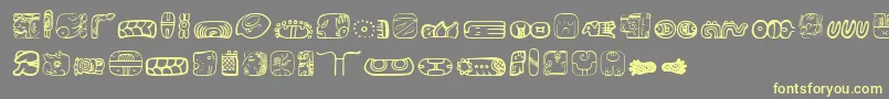 フォントMesoamericaDings – 黄色のフォント、灰色の背景