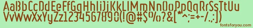 RulerStencilBold-fontti – ruskeat fontit vihreällä taustalla