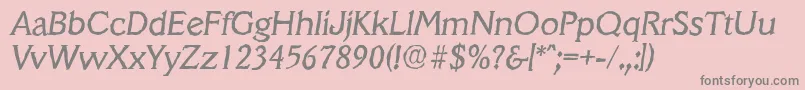 フォントVeracruzantiqueItalic – ピンクの背景に灰色の文字