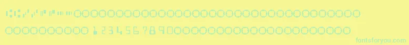 MicrEncoding-Schriftart – Grüne Schriften auf gelbem Hintergrund
