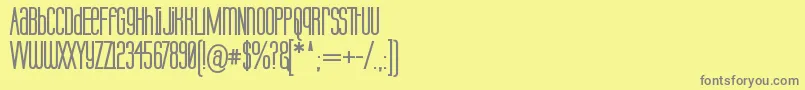 フォントLabtopub – 黄色の背景に灰色の文字