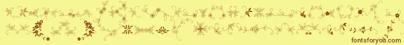 MeninaGraciosaOrnamentsTwo Font – Brown Fonts on Yellow Background