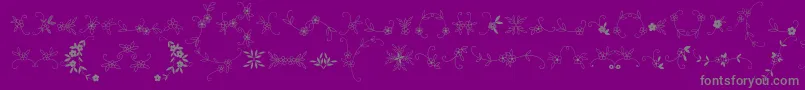 MeninaGraciosaOrnamentsTwo-Schriftart – Graue Schriften auf violettem Hintergrund