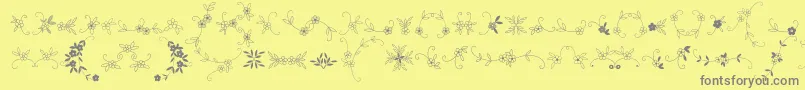 MeninaGraciosaOrnamentsTwo Font – Gray Fonts on Yellow Background