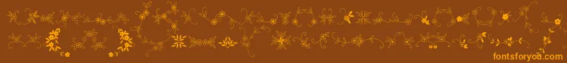MeninaGraciosaOrnamentsTwo-Schriftart – Orangefarbene Schriften auf braunem Hintergrund