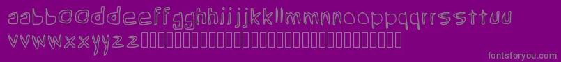 Grean-fontti – harmaat kirjasimet violetilla taustalla