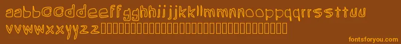 フォントGrean – オレンジ色の文字が茶色の背景にあります。