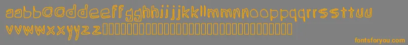 フォントGrean – オレンジの文字は灰色の背景にあります。