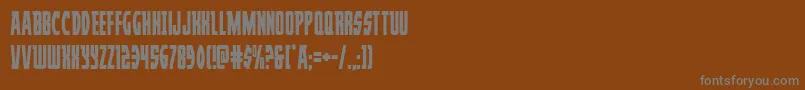 フォントProwlercond – 茶色の背景に灰色の文字