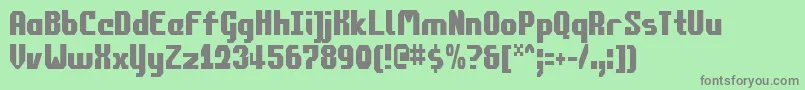 Commonv2c Font – Gray Fonts on Green Background