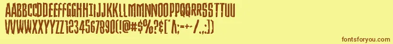 フォントStrangerdangerexpand – 茶色の文字が黄色の背景にあります。