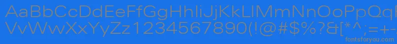 フォントUniversNextProLightExtended – 青い背景に灰色の文字