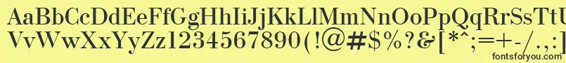 OlgaPlain Font – Black Fonts on Yellow Background