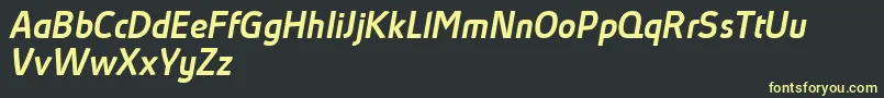 AbsolutProMediumItalicReduced Font – Yellow Fonts on Black Background