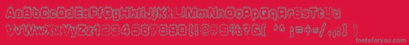 Grungepuddles-Schriftart – Graue Schriften auf rotem Hintergrund