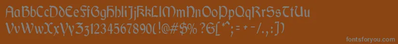 フォントGaeliccondensedRegular – 茶色の背景に灰色の文字