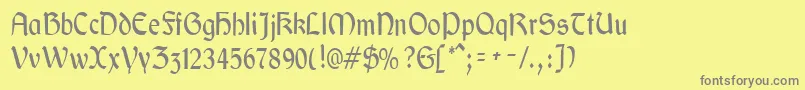 フォントGaeliccondensedRegular – 黄色の背景に灰色の文字