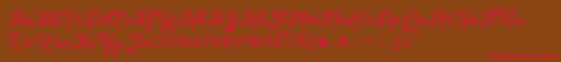 MarchCalligraphyTtf Font – Red Fonts on Brown Background