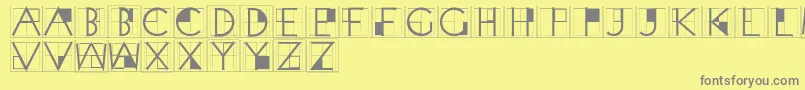 フォントXperimentypothreeCrazy – 黄色の背景に灰色の文字