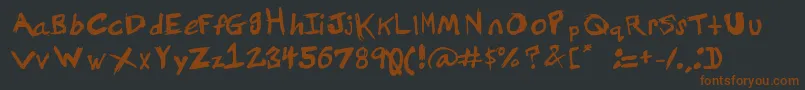 Grundy-Schriftart – Braune Schriften auf schwarzem Hintergrund