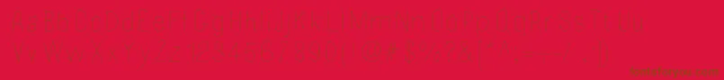 フォントMossy – 赤い背景に茶色の文字