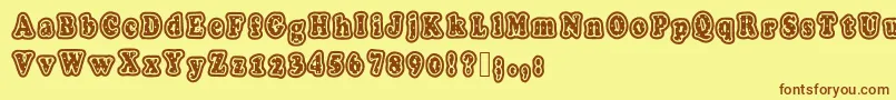 Polkaletterstamp Font – Brown Fonts on Yellow Background