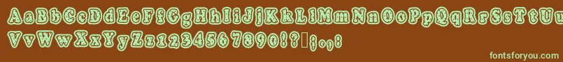 Polkaletterstamp Font – Green Fonts on Brown Background