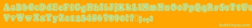 Polkaletterstamp Font – Green Fonts on Orange Background