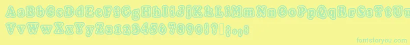 Polkaletterstamp Font – Green Fonts on Yellow Background