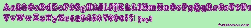 Polkaletterstamp-Schriftart – Violette Schriften auf grünem Hintergrund