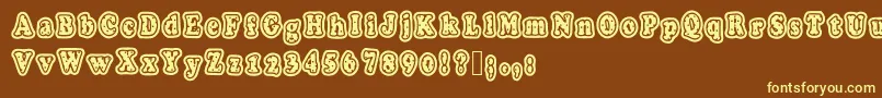 Polkaletterstamp Font – Yellow Fonts on Brown Background