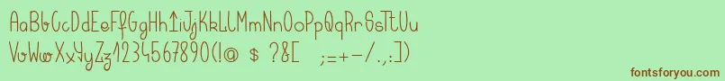 Шрифт Keralaquest – коричневые шрифты на зелёном фоне