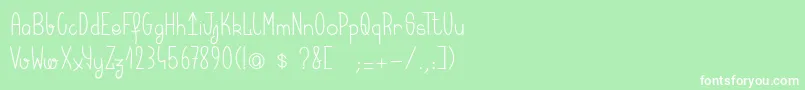 フォントKeralaquest – 緑の背景に白い文字