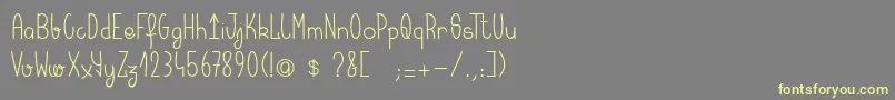 Шрифт Keralaquest – жёлтые шрифты на сером фоне