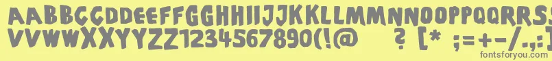 Piscoffinsandghosts-fontti – harmaat kirjasimet keltaisella taustalla