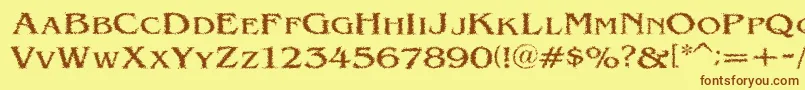 フォントVtcVictorianlintSc – 茶色の文字が黄色の背景にあります。