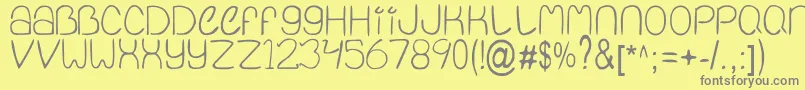 Qinfnty Font – Gray Fonts on Yellow Background