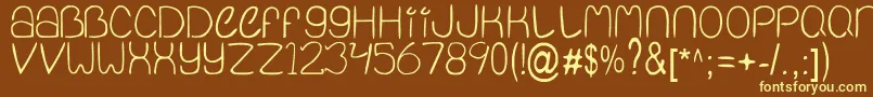 Qinfnty Font – Yellow Fonts on Brown Background