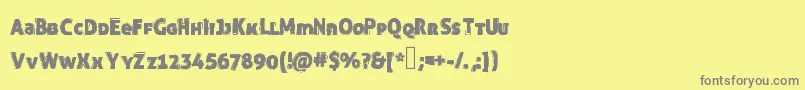 Funnytrip-fontti – harmaat kirjasimet keltaisella taustalla