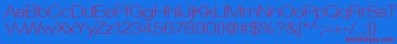 HelveticaLt33ThinExtended Font – Red Fonts on Blue Background