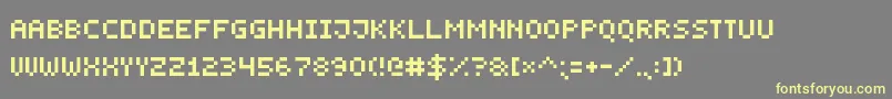 SmallestPixel7-fontti – keltaiset fontit harmaalla taustalla