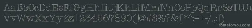 Typemetwo-fontti – harmaat kirjasimet mustalla taustalla