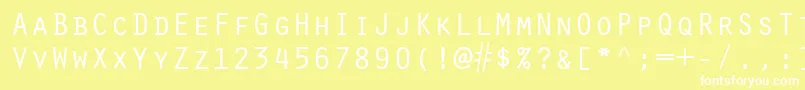 ScribeSsiSmallCaps-fontti – valkoiset fontit keltaisella taustalla