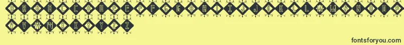 InicialesSt Font – Black Fonts on Yellow Background