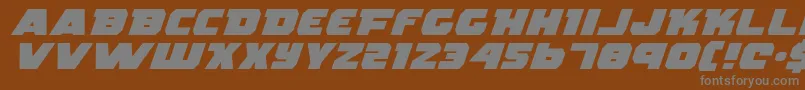 RogueHeroExpandedItalic-fontti – harmaat kirjasimet ruskealla taustalla