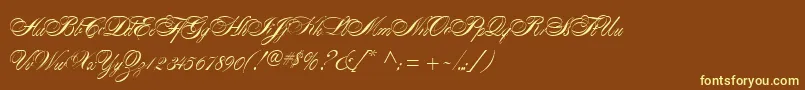 AlexandraScript-fontti – keltaiset fontit ruskealla taustalla