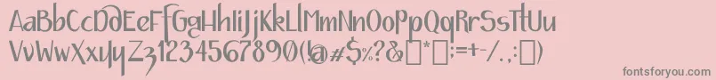 フォントJournal – ピンクの背景に灰色の文字