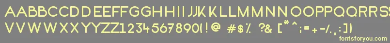 Kofi Font – Yellow Fonts on Gray Background